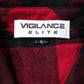 close up of red flannel tag showing hte vigilance elite brand tag