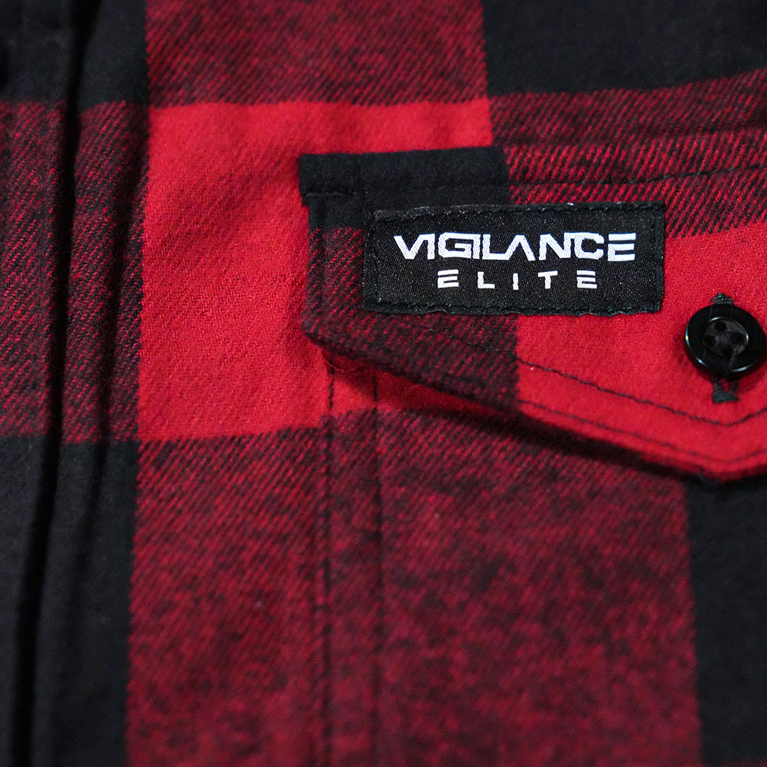 Close up shot of the red flannel pocket with custom vigilance elite branding